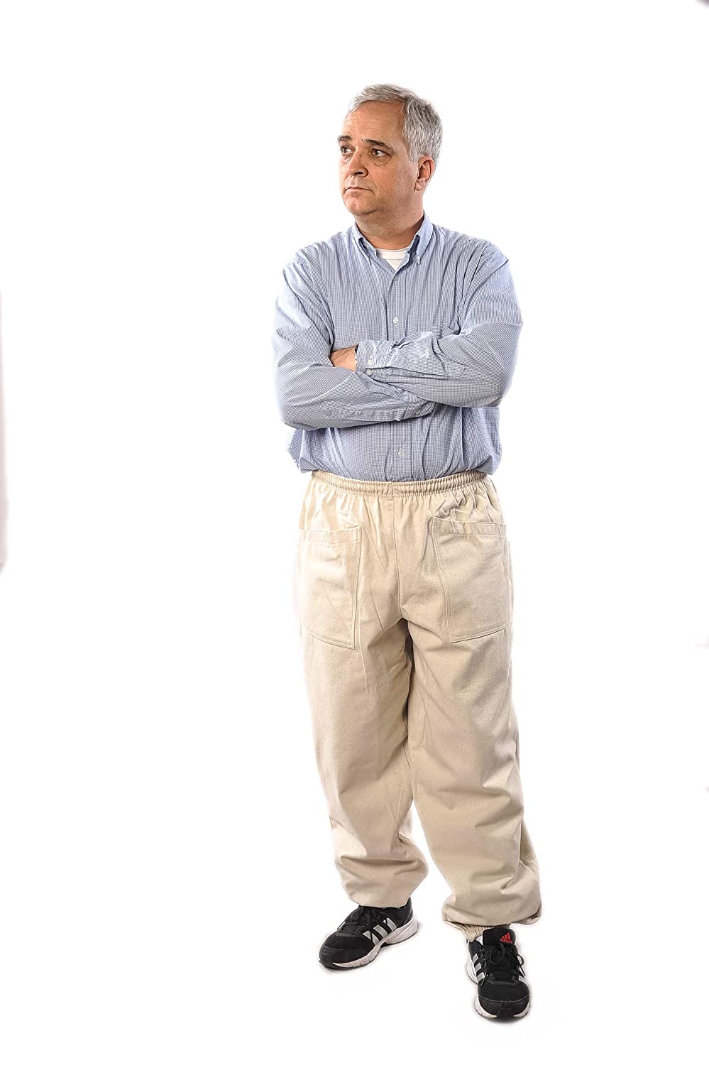 A man is wearing beekeeping pants