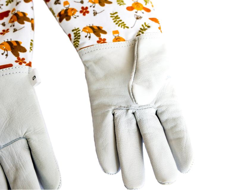 Kids beekeeping gloves, leather beekeeping gloves, floral honey bee printed sleeve, children's beekeeping gloves, protective bee gloves, honey bee design gloves, beekeeping gear for kids, durable beekeeping gloves, printed sleeve gloves, child-friendly beekeeping gloves