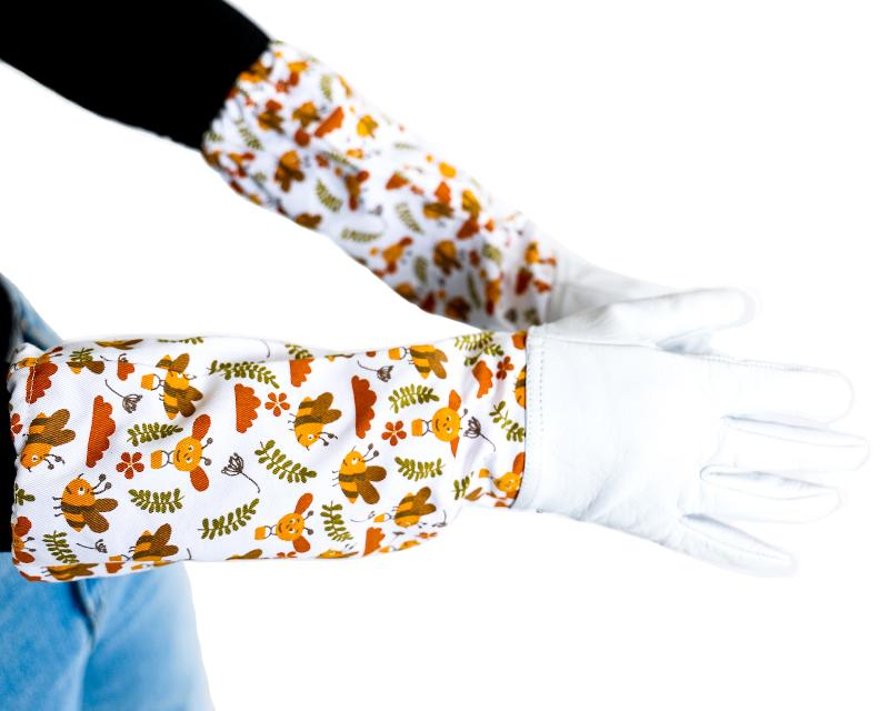 kid wearing printed beekeeping gloves