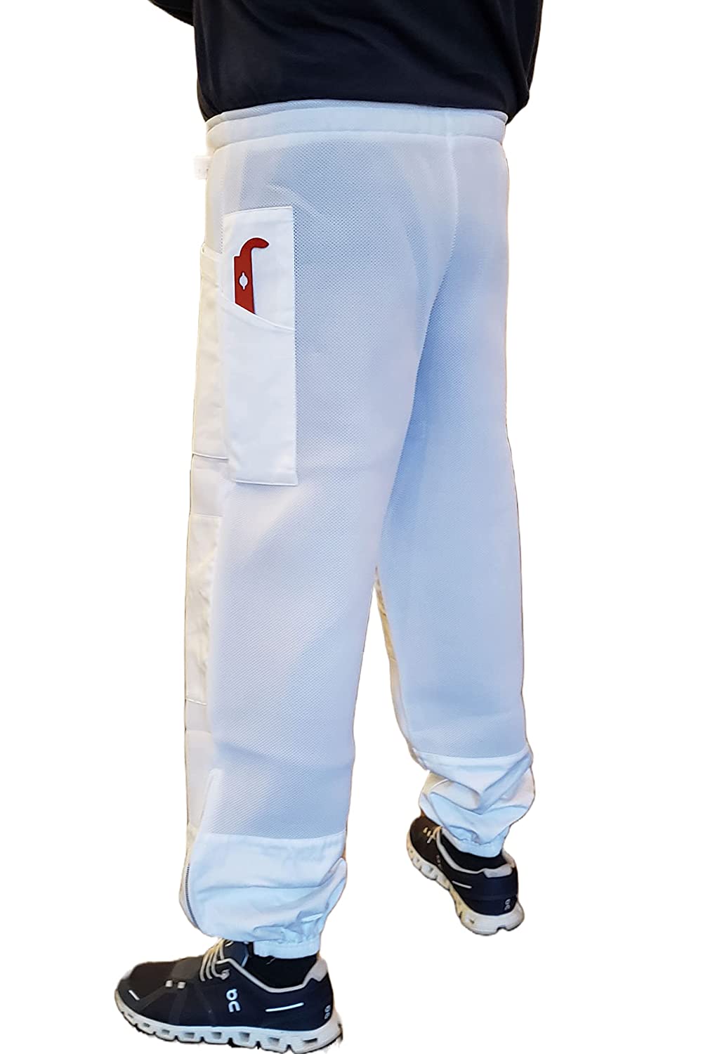 Man wearing white ventilated beekeeping pants