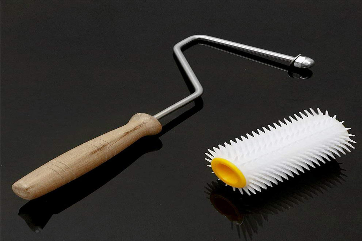 
                  
                    Plastic Honey Punch Roller
                  
                